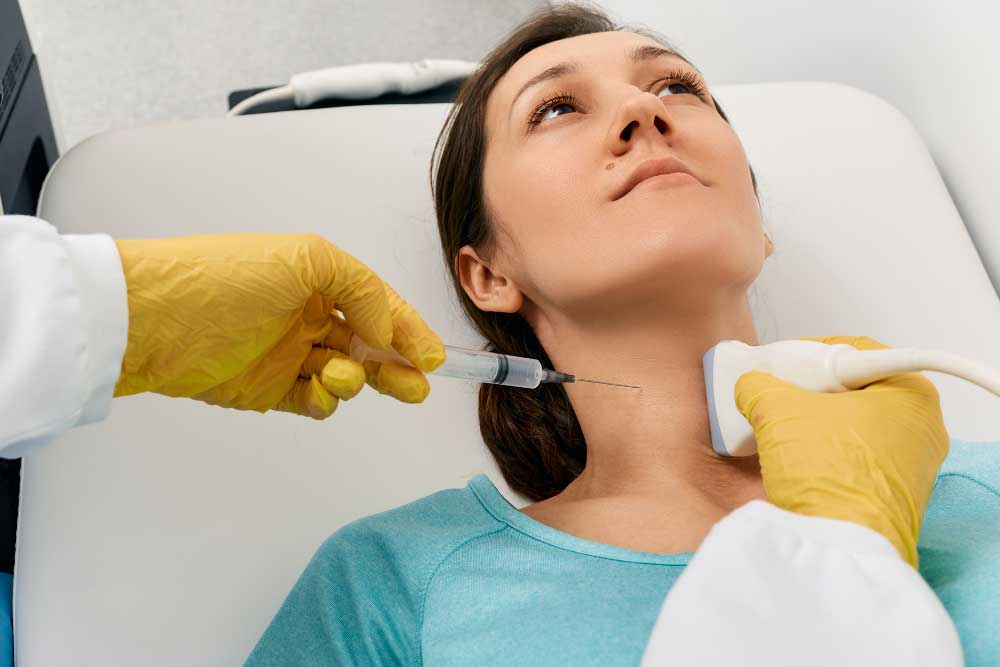 Medical professional in Lancaster performing a neck injection with ultrasound guidance, specializing as an FNA biopsy doctor Lancaster for precise fine needle aspiration procedures. | Cancer Biopsy & FNA Doctor in Los Angeles – Dr. Celina Nadelman Medical professional in Lancaster performing a neck injection with ultrasound guidance, specializing as an FNA biopsy doctor Lancaster for precise fine needle aspiration procedures. | Cancer Biopsy & FNA Doctor in Los Angeles - Dr. Celina Nadelman